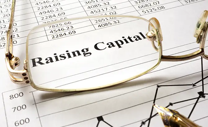 Capital raising advisory with a P&L in the background